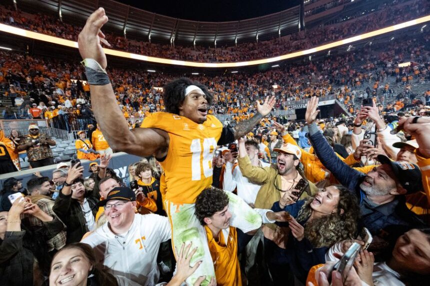 Tennessee running back DeSean Bishop (18) celebrates with fans after an NCAA college football game Saturday, Oct. 17, 2026, in Knoxville, Tenn. (AP Photo/Wade Payne)