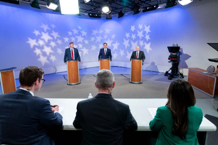 From left to right: Coeur d’Alene attorney Arthur “Art” Macomber, former Idaho Congressman Raúl Labrador and incumbent Idaho Attorney General Lawrence Wasden debate on Idaho Public Television on April 19, 2022. | Aaron Kunz/Idaho Public Television