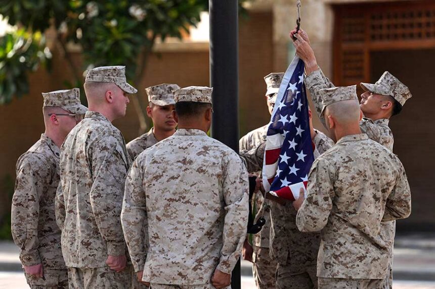 US Marines raise the flag at the US Embassy in Kuwait during a ceremony attended by US Secretary of State Marco Rubio, in Kuwait City on June 24. Mandatory Credit: Eric Lee/Pool/AFP/Getty Images via CNN Newsource