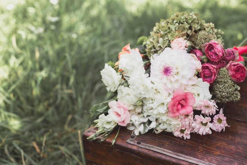 Floral Bouquet on Weathered Wood in a Garden
