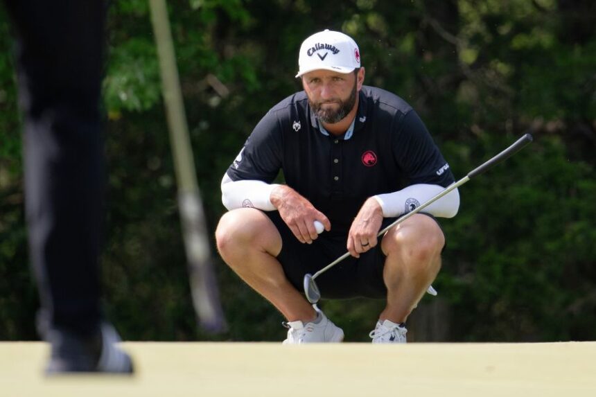 FILE - Captain Jon Rahm of Legion XIII reads his putt during the final round of LIV Golf Bedminster at Trump National Golf Club on Sunday, Aug. 9, 2026 in Bedminster, N.J. (Montana Pritchard/LIV Golf, File)