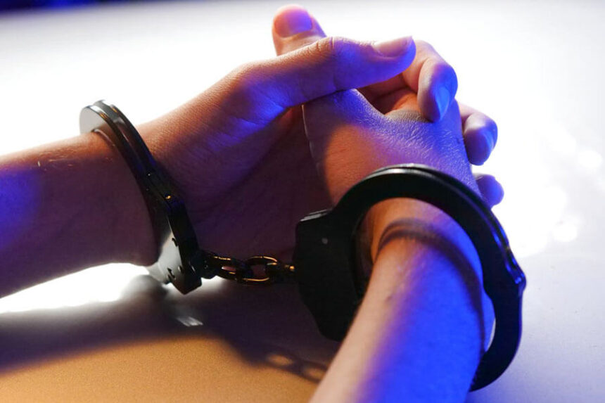hands in handcuffs