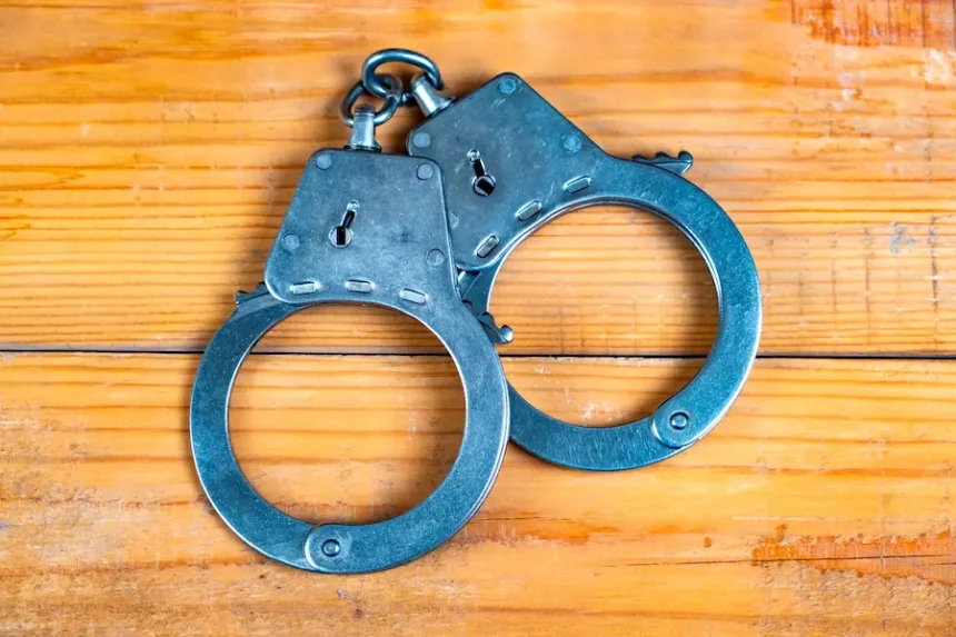 handcuffs on wooden table
