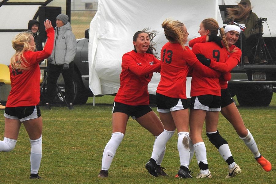 Highland girls soccer celebrate a goal from freshman Kennedy Hunt (9)