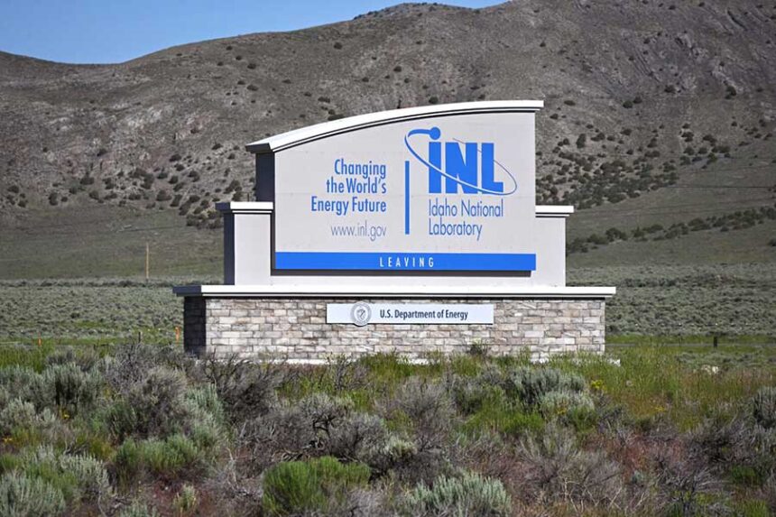 An Idaho National Laboratory sign stands at the exit to the desert site during spring 2023. Much of INL’s research and experimental work supports the development of advanced nuclear technology, integrated energy systems and national security. (Photo courtesy of the U.S. Department of Energy)