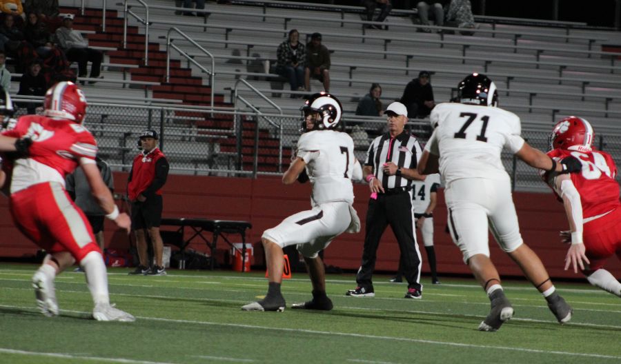 Highland quarterback Jacob Vincent looks pass during Friday's game. | Allan Steele, EastIdahoSports.com.