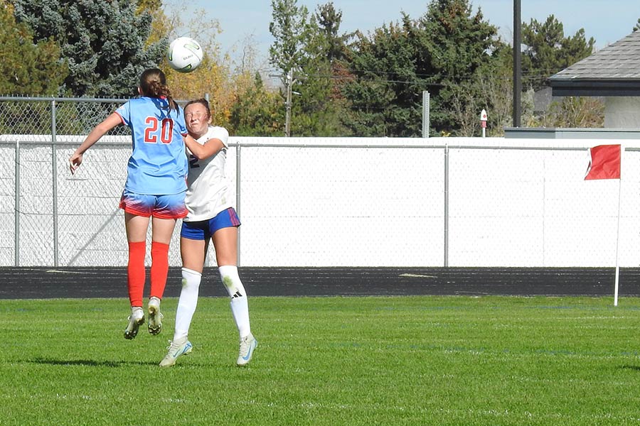 Marsh Valley Maggie McBride gets above McCall-Donnelly player