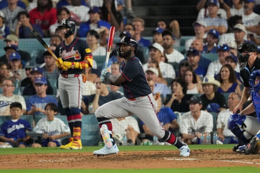 Atlanta Braves' Michael Harris II celebrates after hitting an RBI double during the seventh inning of Game 2 of a National League Division Series baseball game against the Los Angeles Dodgers Sunday, Oct. 4, 2026, in Los Angeles. (AP Photo/Jae C. Hong)
