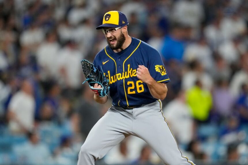 Milwaukee Brewers pitcher Aaron Ashby celebrates the final out of Game 4 of baseball's National League Championship Series between the Milwaukee Brewers and the Los Angeles Dodgers, Thursday, Oct. 15, 2026, in Los Angeles. (AP Photo/Ashley Landis)