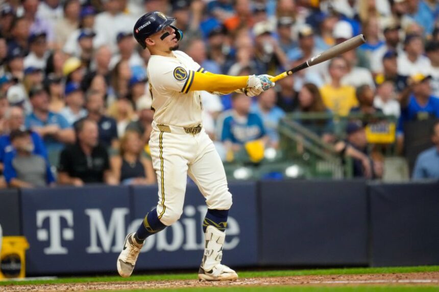 Milwaukee Brewers catcher William Contreras follows through on his solo home run during the fifth inning of Game 2 of baseball's National League Championship Series between the Milwaukee Brewers and the Los Angeles Dodgers, Monday, Oct. 12, 2026, in Milwaukee. (AP Photo/Ashley Landis)