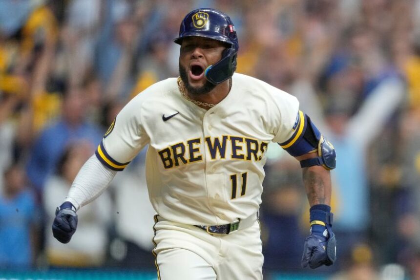Milwaukee Brewers' Jackson Chourio celebrates after hitting a walkoff hit during the ninth inning of Game 2 of a National League Divisional baseball playoff series against the San Diego Padres Sunday, Oct. 4, 2026, in Milwaukee. (AP Photo/Kayla Wolf)