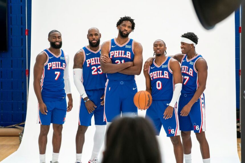 Philadelphia 76ers' Jaylen Brown, LeBron James, Joel Embiid, Tyrese Maxey, and VJ Edgecombe *left to right pose for photos during the NBA basketball team's media day, Monday, Sept. 28, 2026, in Camden, N.J.. (AP Photo/Chris Szagola)