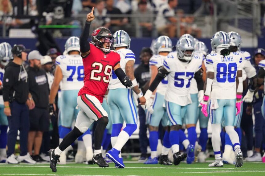 Tampa Bay Buccaneers safety Miles Killebrew (29) celebrates after the Buccaneers recovered a fumbled kickoff return by the Dallas Cowboys in the second half of an NFL football game in Arlington, Texas on Thursday, Oct. 8, 2026. (AP Photo/Julio Cortez)