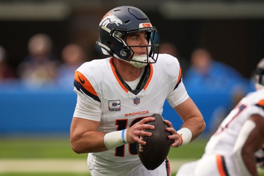 Denver Broncos quarterback Bo Nix gets set to pass during the first half of an NFL football game against the Los Angeles Chargers, Sunday, Oct. 11, 2026, in Inglewood, Calif. (AP Photo/Gregory Bull)