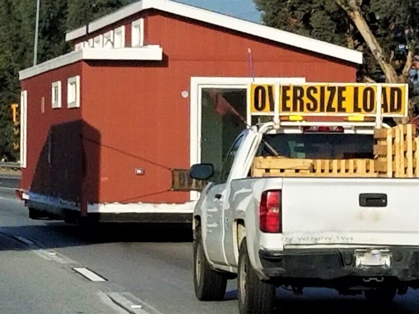 oversize load tiny house on truck in city 2026 09 25 05 42 04 utc