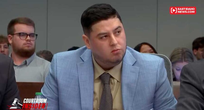 Miguel Salguero Olivares listens to his attorney's opening statement in his murder trial on Wednesday, Oct. 7, 2026, at the Durham County Courthouse in Durham, N.C.
