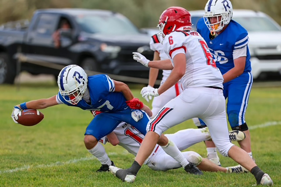 Rockland's Zach Permann reaches across the goal line for a touchdown