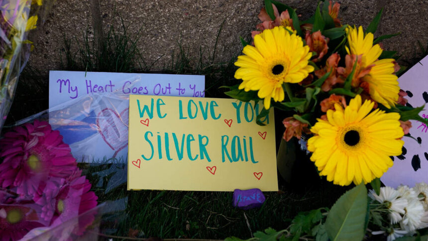 A makeshift memorial honors the victims of a shooting Thursday at Silver Rail Elementary School in Bend, Oregon. | David Ryder, Reuters