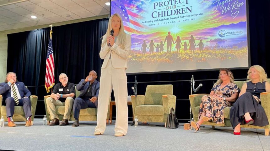 Elizabeth Smart is aiding in the push for creation of a three-digit emergency phone number for those suffering sexual abuse and being trafficked. She's pictured speaking Tuesday at Weber State University in Ogden, where the issue was discussed. (Tim Vandenack, KSL.com)
