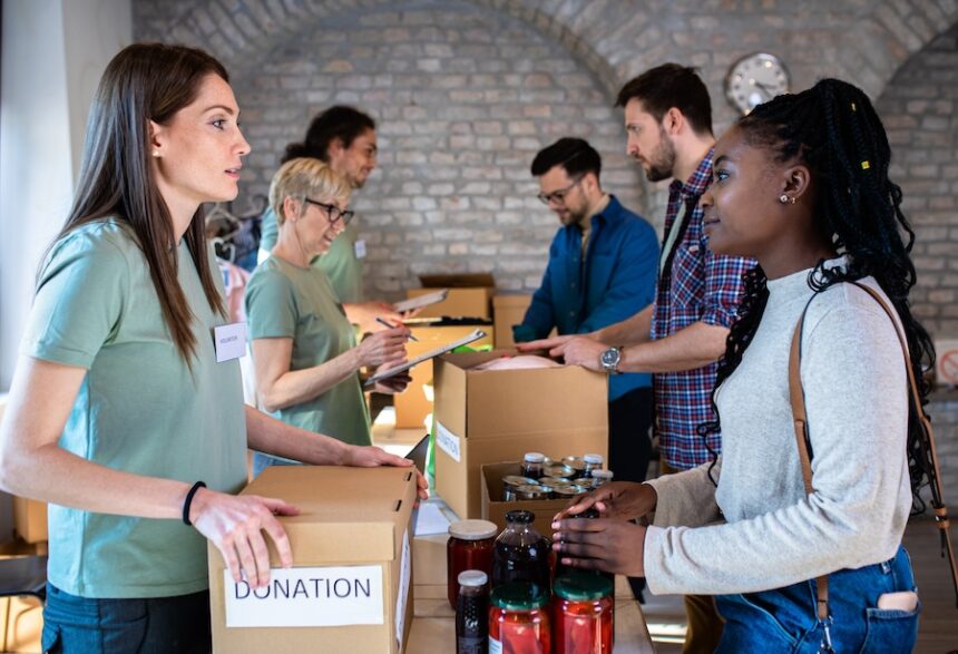 volunteers sorting donations into boxes inside bui 2026 09 23 13 12 40 utc