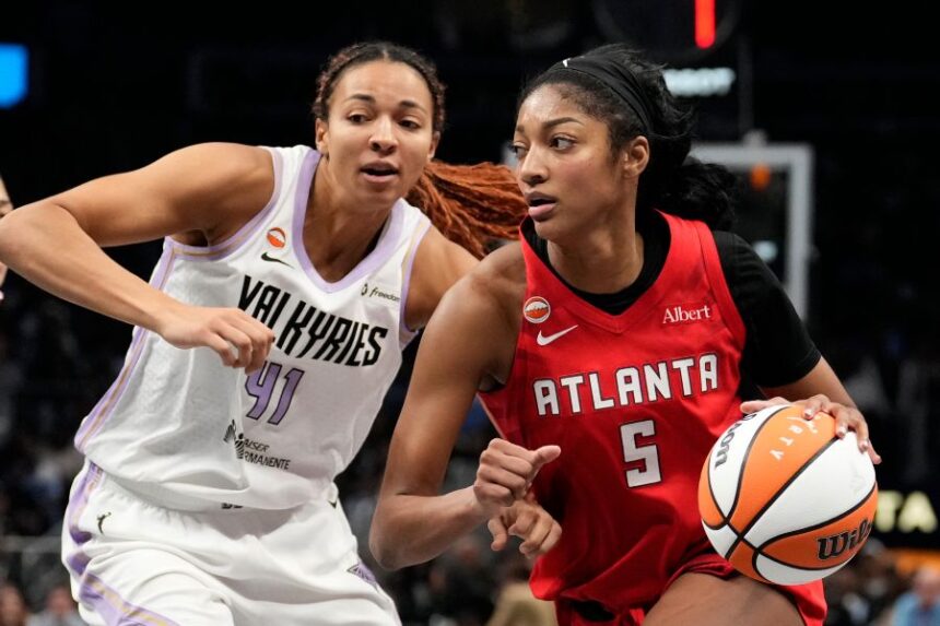 Atlanta Dream's Angel Reese (5) goes up to shoot against Golden State Valkyries' Kiah Stokes during the second half of Game 6 of the WNBA basketball finals on Thursday, Oct. 29, 2026, in Atlanta. (AP Photo/Brynn Anderson)