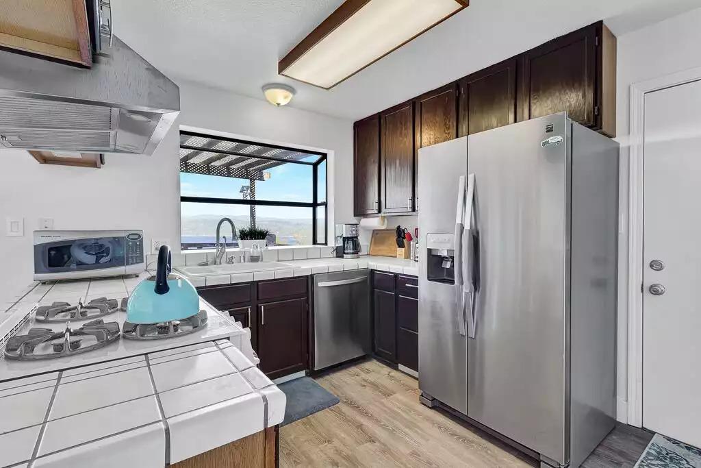 Well stocked kitchen with all new appliances, microwave, drip coffee maker & ground coffee Well stocked kitchen with all new appliances, microwave, drip coffee maker & ground coffee - NEW Unobstructed Lake/Mountain View home, movie rm - Kelseyville