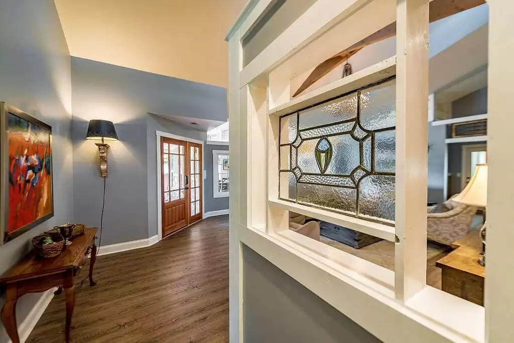 Stained glass pieces were cleverly incorporated into the home's construction. Stained glass pieces were cleverly incorporated into the home's construction. - Fox View Cottage - Rising Fawn