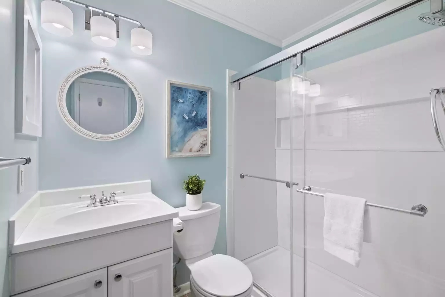 Enjoy the privacy of the ensuite primary bathroom with a sleek brand new walk-in shower. Enjoy the privacy of the ensuite primary bathroom with a sleek brand new walk-in shower. - HHI TIDE 21, Family Vacation Rental, HHB&T Resort - Hilton Head Island