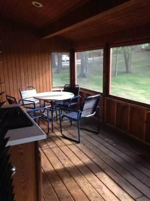 Private screened in deck with electric grill. Perfect for grilling or relaxing while watching the sun set or rise. Chairs included for the perfect relaxation spot! Private screened in deck with electric grill. Perfect for grilling or relaxing while watching the sun set or rise. Chairs included for the perfect relaxation spot! - Entire Cabin 1 Wisc Dells 3 Beds(2Bedrooms) 2Baths - 63 Christmas Mountain Road