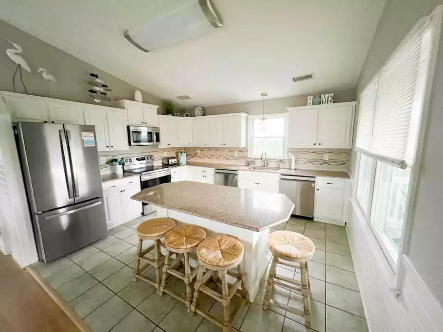 Fully stocked, updated kitchen with new stainless appliances, including 2 DW; center island with seating for 4 Fully stocked, updated kitchen with new stainless appliances, including 2 DW; center island with seating for 4 - It’s Always Sunny In Corolla - Corolla