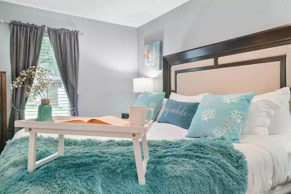 Spa-inspired master bedroom is beautifully decorated and set up for a relaxing stay. Spa-inspired master bedroom is beautifully decorated and set up for a relaxing stay. - Heated Saltwater Pool*Harry Potter*Fire Pit*BBQ*EV - St. Augustine
