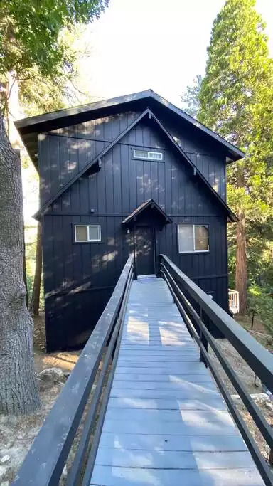 Level entrance from rear parking Level entrance from rear parking - 'Glimmer Chalet' View Lake Arrowhead in treetops - Lake Arrowhead