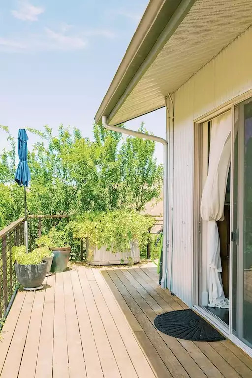 Your private deck area overlooking fruit trees and vineyard views. Your private deck area overlooking fruit trees and vineyard views. - Be Suite - Vineyard Retreat - Paso Robles
