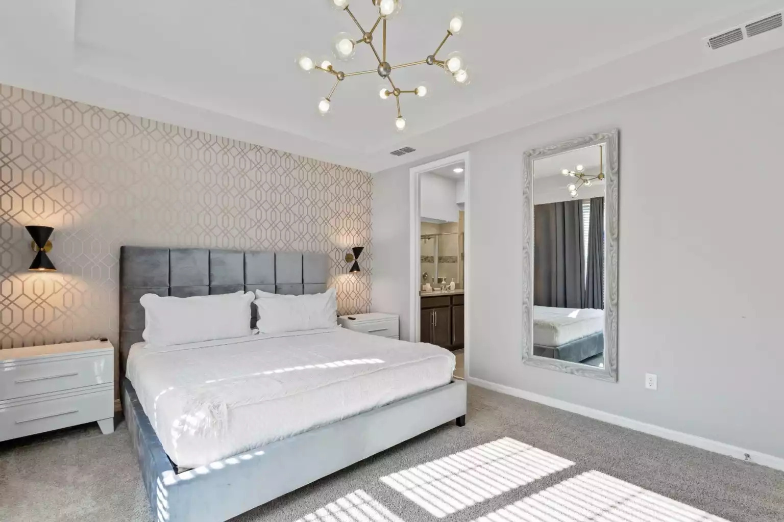 Master bedroom with king bed, full bathroom with shower, smart tv and closet. Master bedroom with king bed, full bathroom with shower, smart tv and closet. - Luxury Vacation Home Minutes From Disney World - Kissimmee