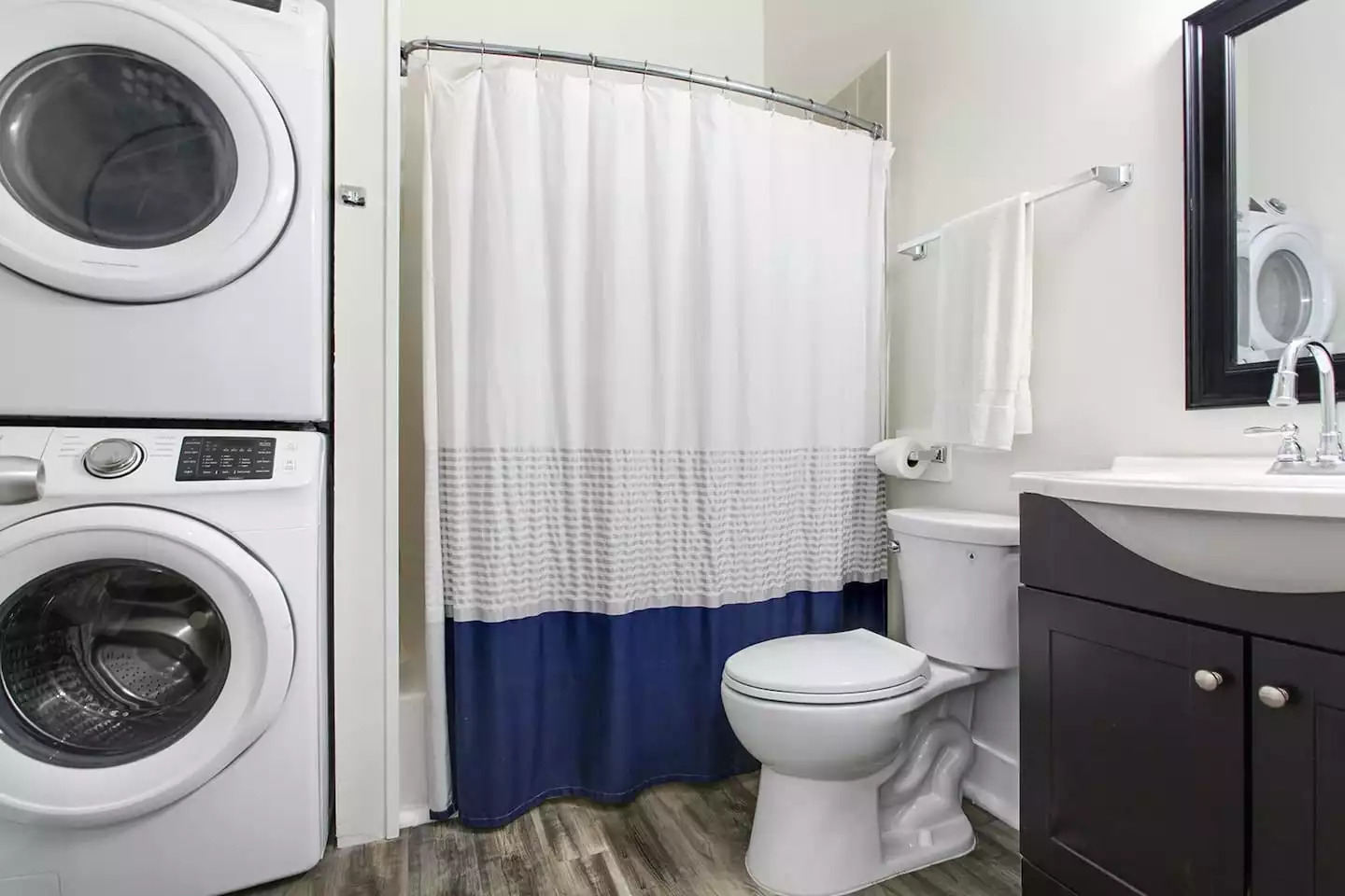 Downstairs full bathroom with laundry. Downstairs full bathroom with laundry. - Unit 1 – Charming Authentic Mid City! - New Orleans