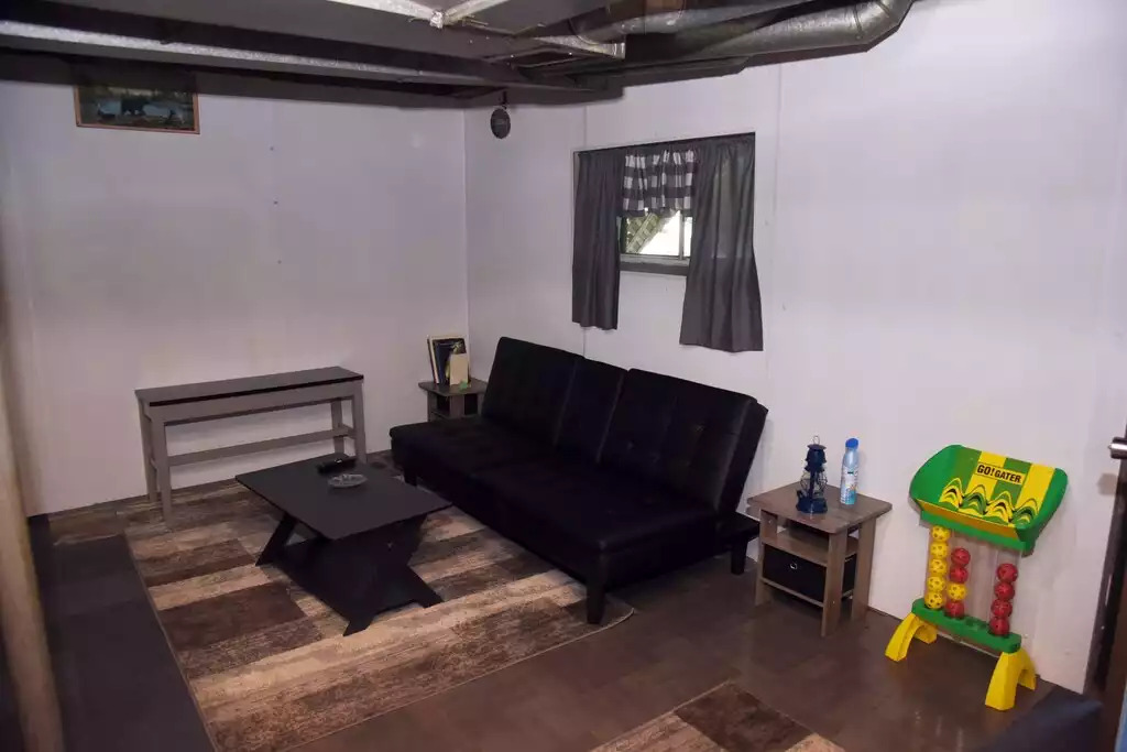 The basement offers a 43 inch smart tv and a futon for added sleeping space. The basement offers a 43 inch smart tv and a futon for added sleeping space. - Legacy Lake House - Kingsley