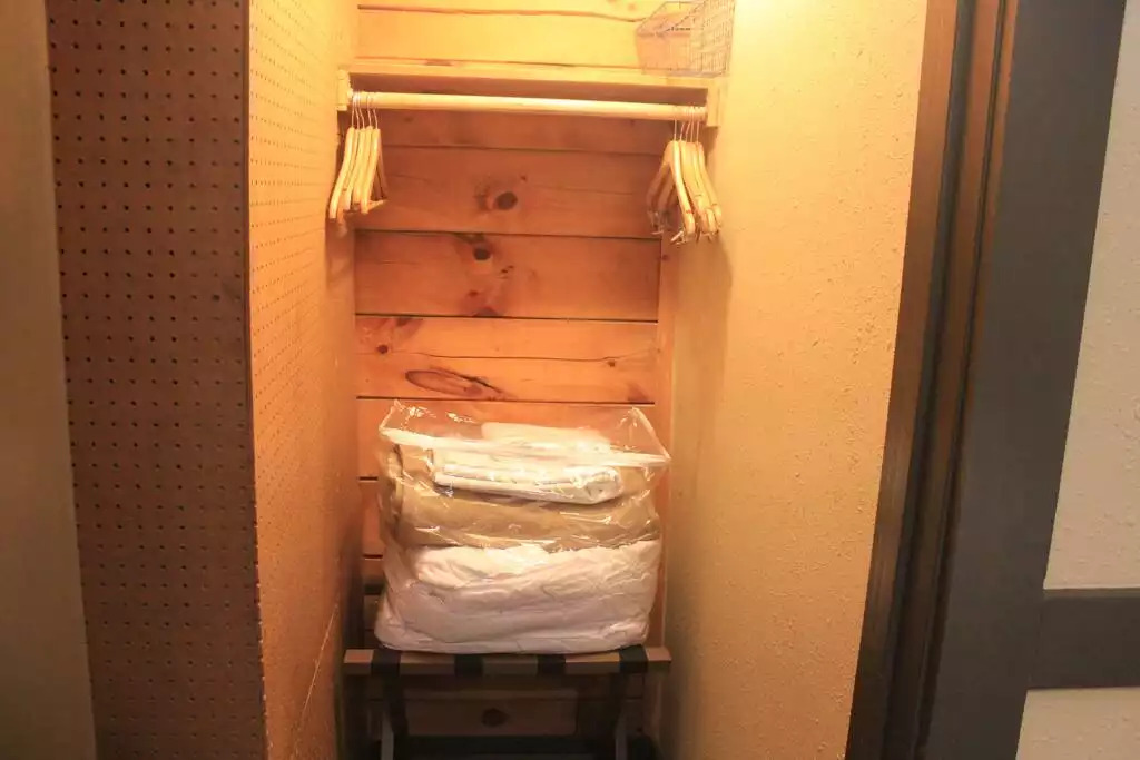 This walk in closet attached to the bedroom with the queen bed includes hangers and extra bedding for the sleeper sofa in the living room. This walk in closet attached to the bedroom with the queen bed includes hangers and extra bedding for the sleeper sofa in the living room. - Entire Cabin 3 Wisc Dells 3 Beds(2Bedrooms) 2Baths - Wisconsin Dells