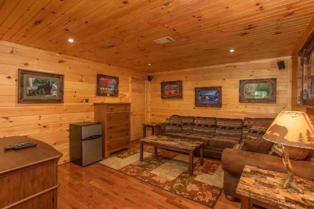 Another view of theatre room. Sofa is a queen sized sofa sleeper with new memory foam mattress. Another view of theatre room. Sofa is a queen sized sofa sleeper with new memory foam mattress. - Secluded Luxury 2 Bdrm Cabin w/Theatre Room & Pond - Sevierville
