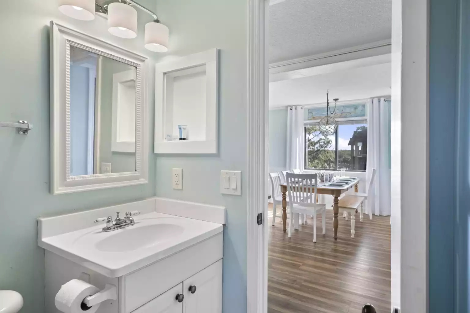 The second bathroom is off the hallway, adjacent to the second bedroom. The second bathroom is off the hallway, adjacent to the second bedroom. - HHI TIDE 21, Family Vacation Rental, HHB&T Resort - Hilton Head Island