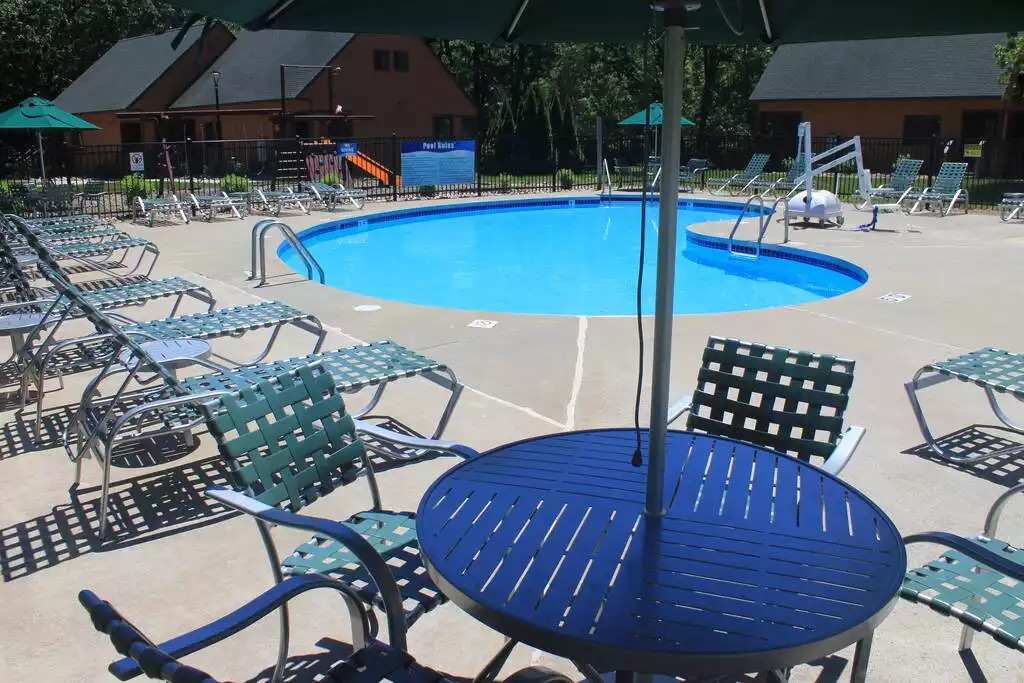 With four outdoor pools on the property, you have options when it comes to swimming or getting some sun. This pool with generous seating is walking distance to your cabin. With four outdoor pools on the property, you have options when it comes to swimming or getting some sun. This pool with generous seating is walking distance to your cabin. - Entire Cabin 1 Wisc Dells 3 Beds(2Bedrooms) 2Baths - 63 Christmas Mountain Road