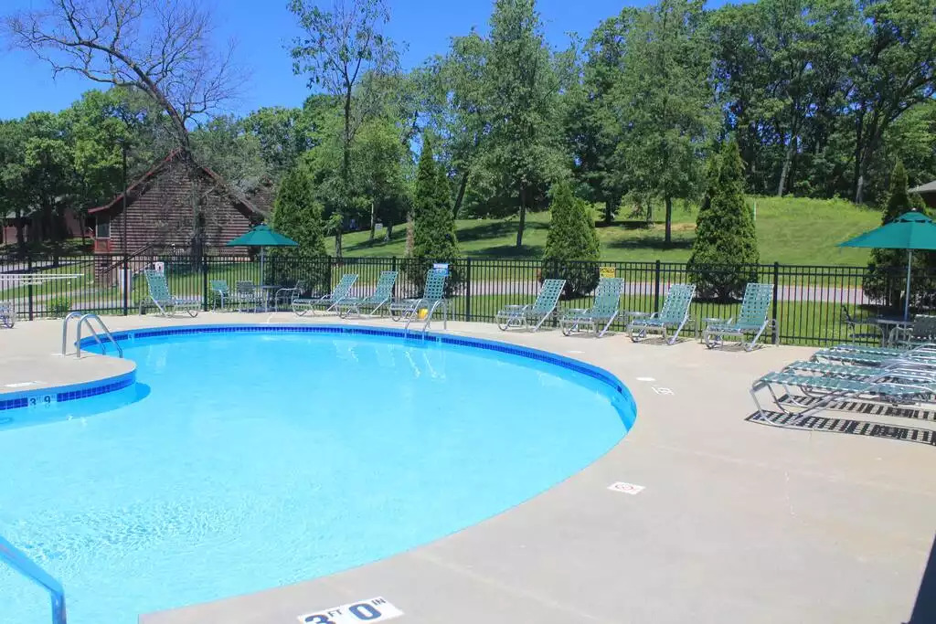 Plenty of trees and beautiful scenery await your stay. Outdoor pools are open in the summer from 10 AM to 8 PM. No need to pack your beach towel, they are included for your use during your stay! Plenty of trees and beautiful scenery await your stay. Outdoor pools are open in the summer from 10 AM to 8 PM. No need to pack your beach towel, they are included for your use during your stay! - Entire Cabin 1 Wisc Dells 3 Beds(2Bedrooms) 2Baths - 63 Christmas Mountain Road