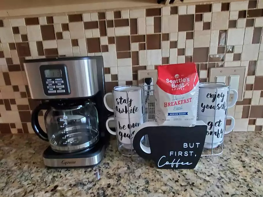 A bag of coffee, variety of teas, sugar and sweeteners are provided for your enjoyment along with a Capresso 12-cup coffee maker. Coffee grinder is also available. A bag of coffee, variety of teas, sugar and sweeteners are provided for your enjoyment along with a Capresso 12-cup coffee maker. Coffee grinder is also available. - Heated Saltwater Pool*Harry Potter*Fire Pit*BBQ*EV - St. Augustine