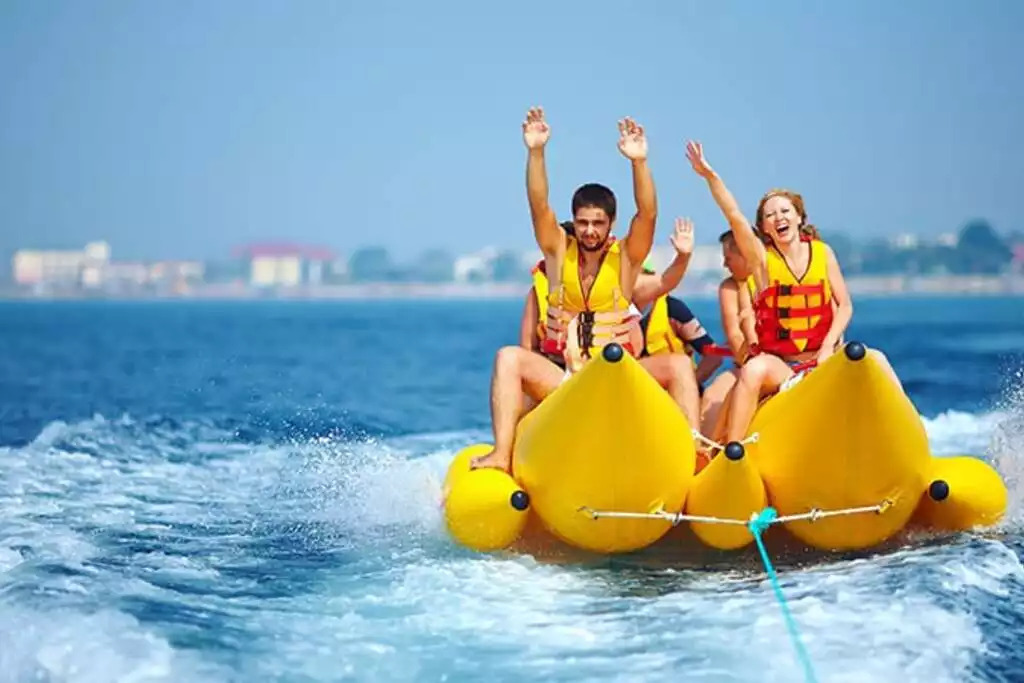 Feeling a little adventurous? Enjoy a banana boat ride for the whole family! Feeling a little adventurous? Enjoy a banana boat ride for the whole family! - Shipwrecked Beach House Orange Beach, Alabama - Orange Beach