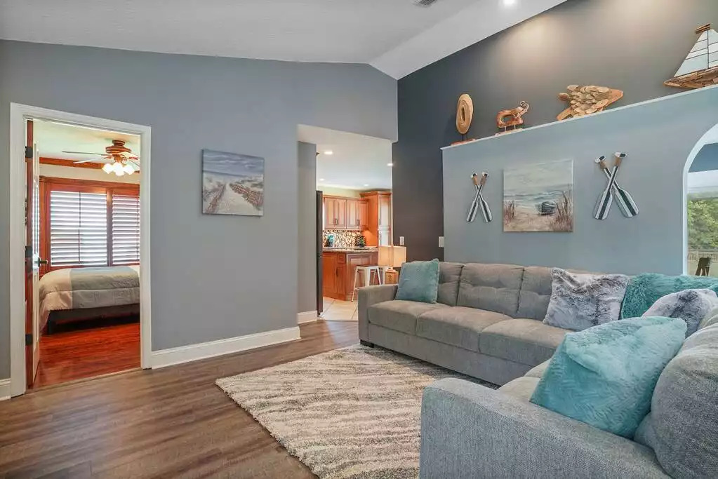 Living room, 2nd bathroom and kitchen. Living room, 2nd bathroom and kitchen. - Heated Saltwater Pool*Harry Potter*Fire Pit*BBQ*EV - St. Augustine