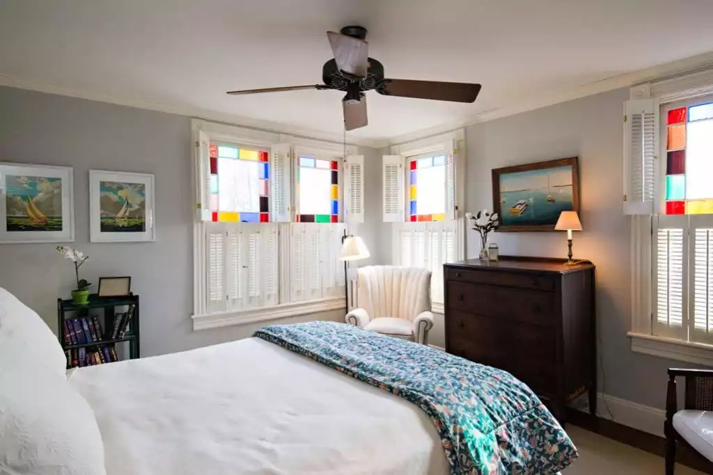 Chadwick Cottage Vacation Rental Home. Bedroom with Queen Anne Stained Glass windows. Vacation Rentals Asbury Park. Vacation Rentals Ocean Grove. Chadwick Cottage Vacation Rental Home. Bedroom with Queen Anne Stained Glass windows. Vacation Rentals Asbury Park. Vacation Rentals Ocean Grove. - Chadwick Cottage Vacation Rental Home - Ocean Grove