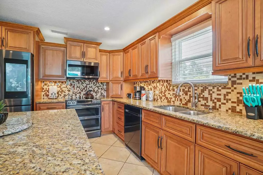Fully equipped kitchen stocked with pots and pans. Fully equipped kitchen stocked with pots and pans. - Heated Saltwater Pool*Harry Potter*Fire Pit*BBQ*EV - St. Augustine