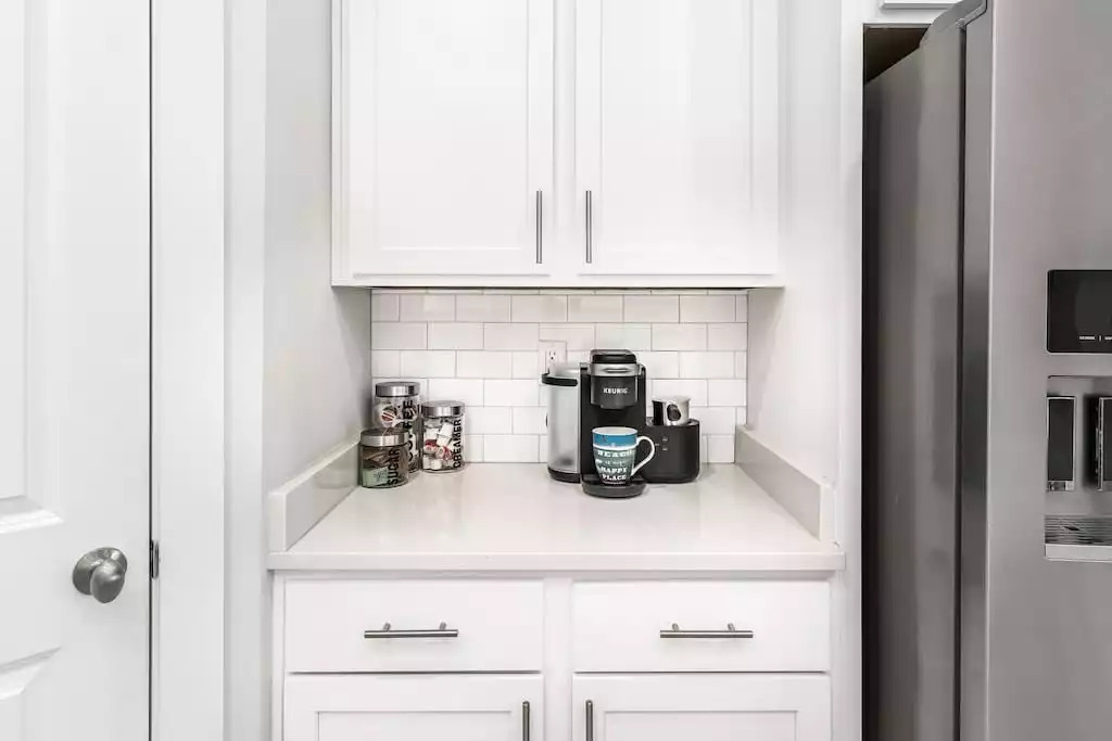 With this well-equipped coffee bar, you’ll be ready to enjoy your morning relaxing on the back porch taking in the view while enjoying a cup! The coffee bar comes with a full size coffee pot, Keurig, starter set of k-cups, sweeteners and creamer. With this well-equipped coffee bar, you’ll be ready to enjoy your morning relaxing on the back porch taking in the view while enjoying a cup! The coffee bar comes with a full size coffee pot, Keurig, starter set of k-cups, sweeteners and creamer. - Shipwrecked Beach House Orange Beach, Alabama - Orange Beach