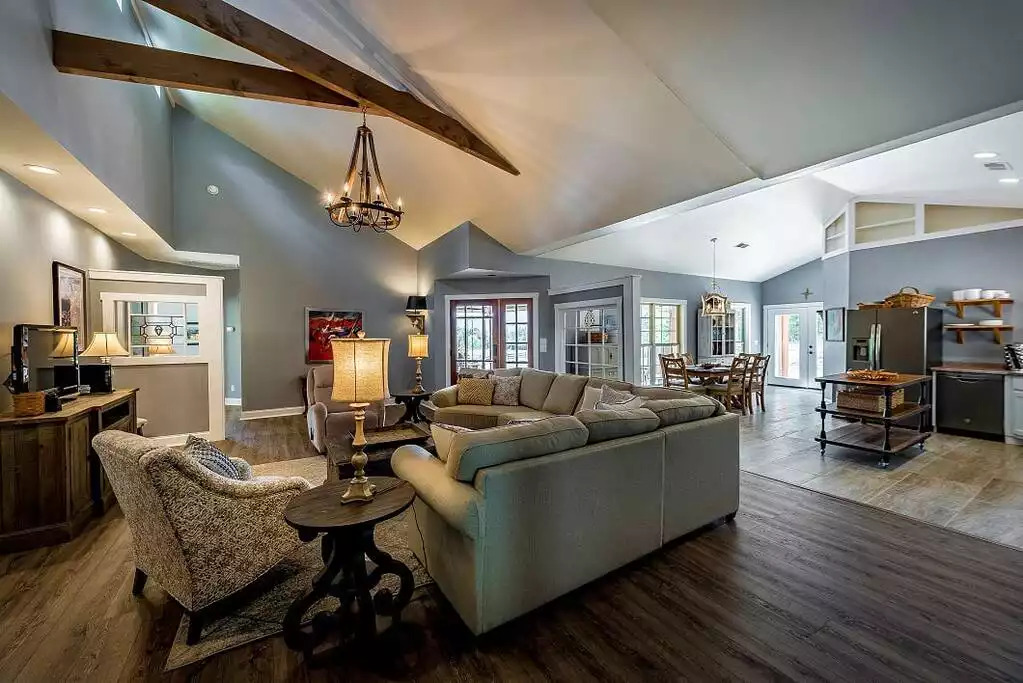 Unique wood beams and a one-of-a-kind chandelier draw the eye upward. Unique wood beams and a one-of-a-kind chandelier draw the eye upward. - Fox View Cottage - Rising Fawn