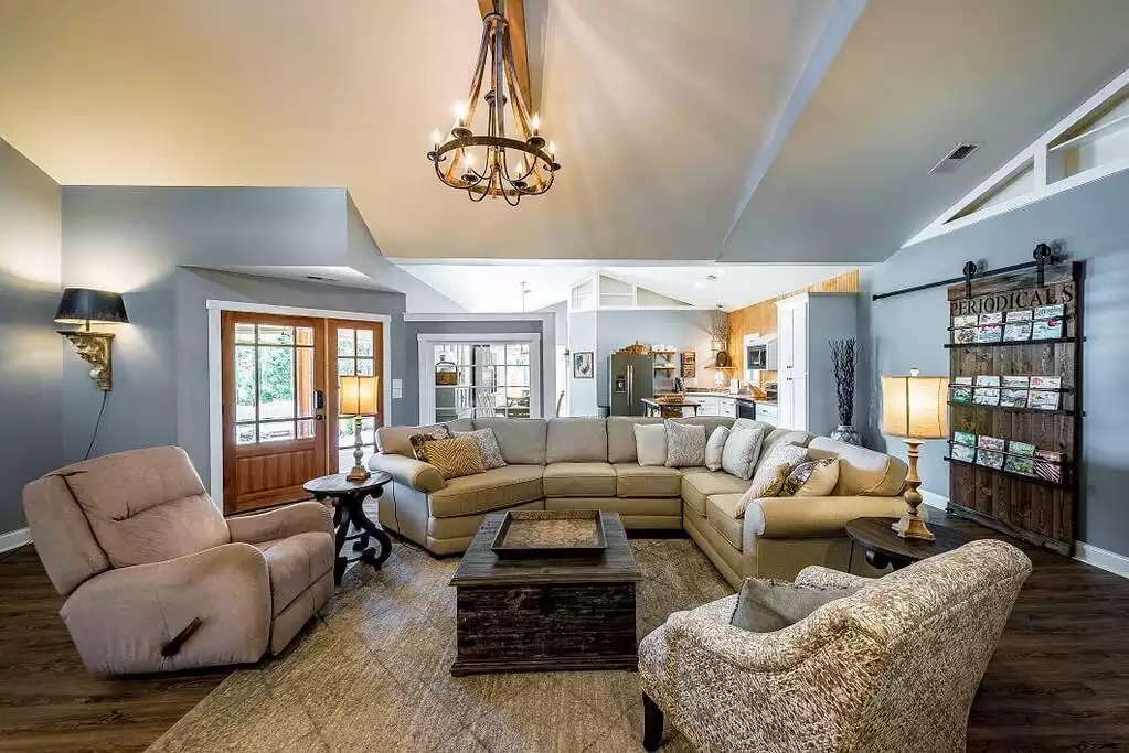 The laundry room with full-size washer & dryer is camouflaged behind barn door. The laundry room with full-size washer & dryer is camouflaged behind barn door. - Fox View Cottage - Rising Fawn