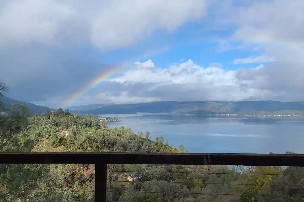 A full rainbow on Clear Lake captured from the picture window in living room A full rainbow on Clear Lake captured from the picture window in living room - NEW Unobstructed Lake/Mountain View home, movie rm - Kelseyville